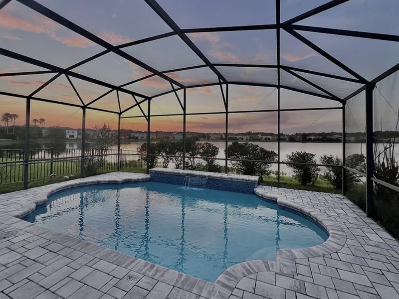 A lakefront pool home in Orlando listed by Firelight Realty Group